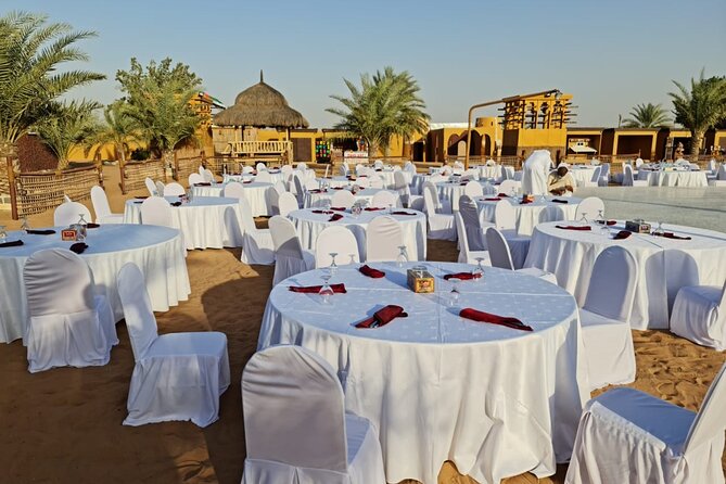 Premium Red Dunes Safari | Camel Ride | Dune Bashing | Sand Ski - Camel riding, coffee, and the Bedouin-style camp