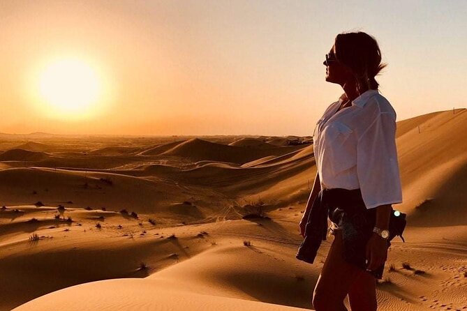 Premium Red Dunes Safari | Camel Ride | Dune Bashing | Sand Ski - Barbecue dinner and an entertainment-heavy evening