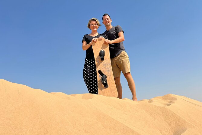 Private Abu Dhabi Sunset Desert Safari with Sand Boarding - Meeting camels and learning about Bedouin life