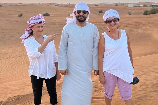 Private Desert Safari Tour Adventure in Dubai - A high dune, wide views, and sunset photographs