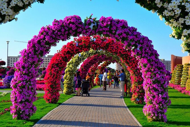 Private Half-Day Tour in Dubai Miracle Garden and Global Village - Booking, Timing, and Cancellation