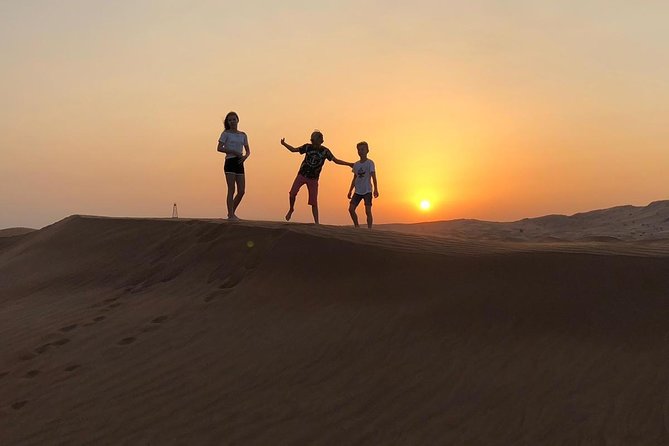 Private Morning Desert Safari Dubai with Dune Bashing & Sandboard - Sandboarding on the dunes