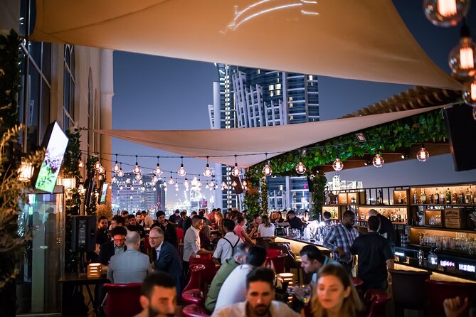 Pub Crawl Dubai: Nightlife Tours - Stop two: Al Barsha brings the group together