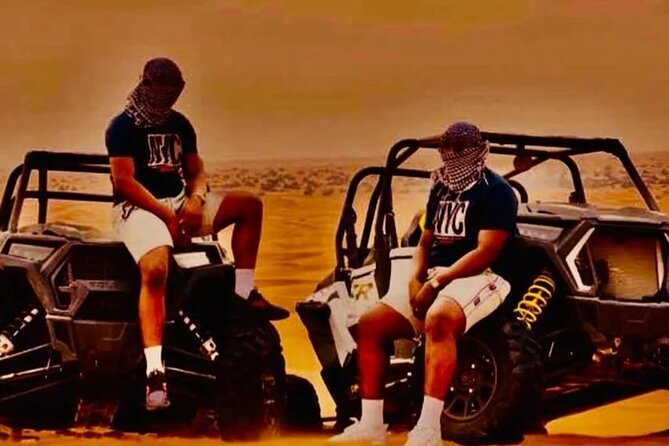 Quad Bike Dubai Desert Safari with BBQ Dinner Sandboard and Show - From Dubai pickup to the Lahbab red dunes