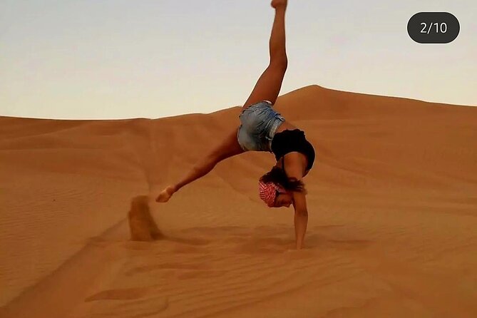 Quad Bike Dubai Desert Safari with BBQ Dinner Sandboard and Show - Al Aweer camp: four hours of dinner and desert traditions