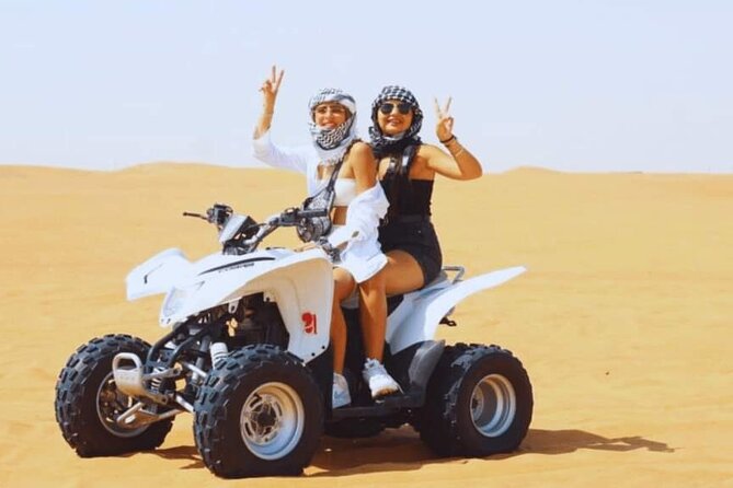 Quad Bike Dubai Private Tour - Riding the quad bike or dune buggy