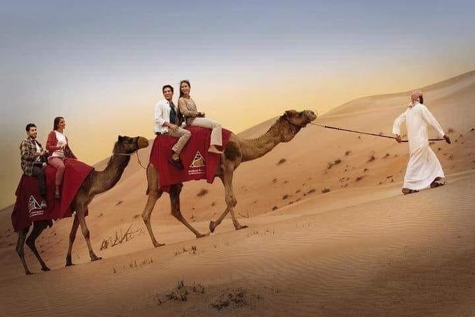 Red Dune Desert Safari with BBQ Dinner, Sand Boarding Dance Shows - Belly dance, tanoura, and the fire show