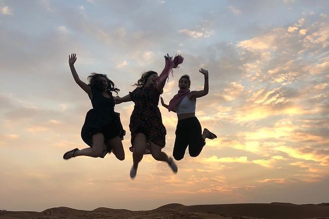 Red Dune evening Desert Safari With BBQ dinner and Camel ride - Tanoura, fire, and belly dance after dark