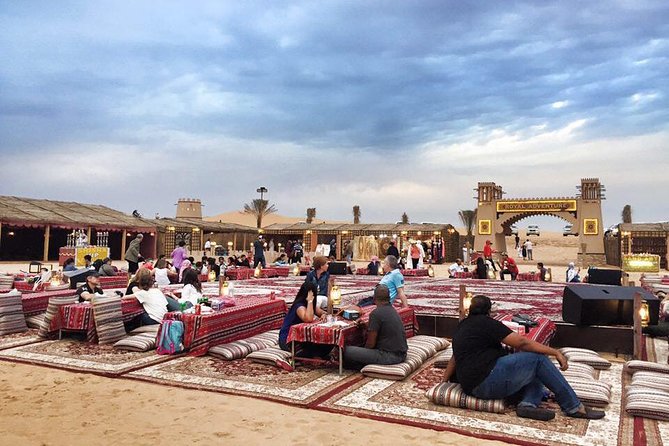 Red Dune Safari Adventure with BBQ Dinner Experience - Sandboarding, camels, henna, and Arabic welcome