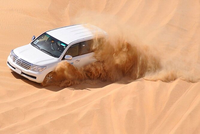 Red Dunes Desert Safari with 4x4 Pick up & Drop, Camel ride, BBQ and Live shows - Camel Ride and Bedouin-Style Camp