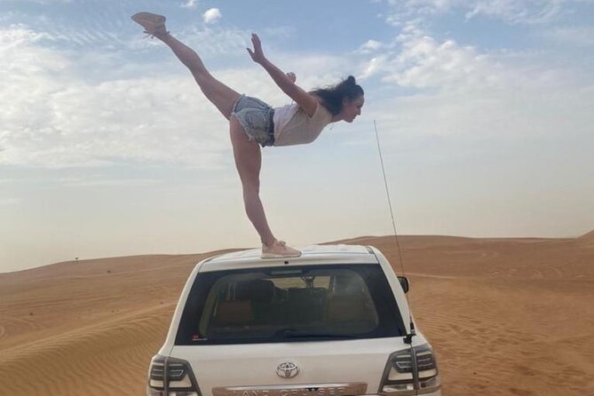 Red Dunes Desert Safari with 4x4 Pick up & Drop, Camel ride, BBQ and Live shows - Sunset Photos and Sandboarding