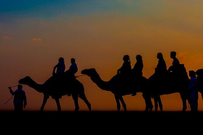 Sunset Camel Trekking with Falcon Show & VIP BBQ Dinner - Leaving Dubai for the evening desert