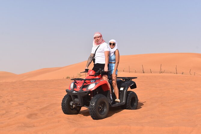 Sunset Desert Safari Quad bike Camel ride Sand Board & BBQ Dinner - What makes this six-hour desert evening worth considering