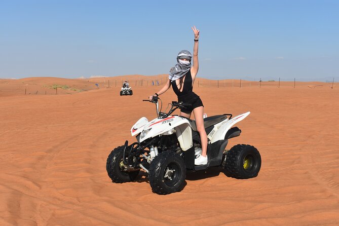 Sunset Desert Safari Quad bike Camel ride Sand Board & BBQ Dinner - From Dubai streets to the Al Lahbab dunes