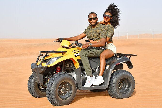 Sunset Desert Safari Quad bike Camel ride Sand Board & BBQ Dinner - The guide can shape the whole experience