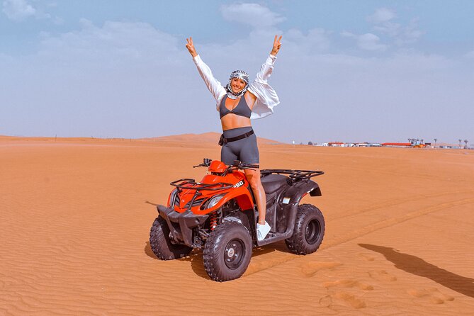 Sunset Desert Safari Quad bike Camel ride Sand Board & BBQ Dinner - Dune bashing, sandboarding, and sunset photographs
