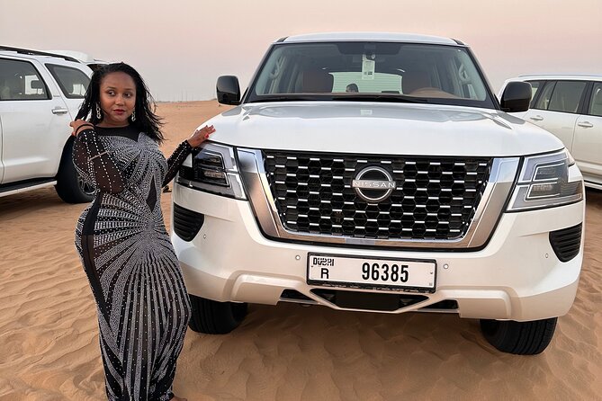 Sunset Desert safari with Camel Ride Sand Board & BBQ Dinner - The red dunes of Al Lahbab set the tone