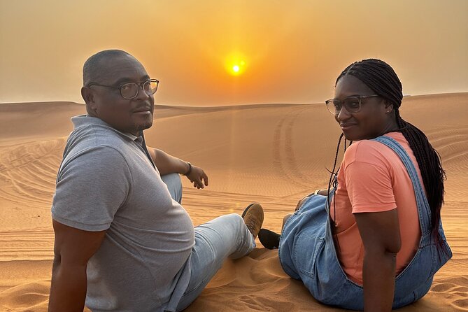 Sunset Desert safari with Camel Ride Sand Board & BBQ Dinner - The Al Awir camp adds food and evening entertainment