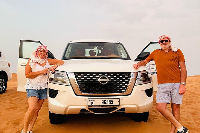 Sunset Desert safari with Camel Ride Sand Board & BBQ Dinner - Sandboarding gives you a second way to enjoy the dunes