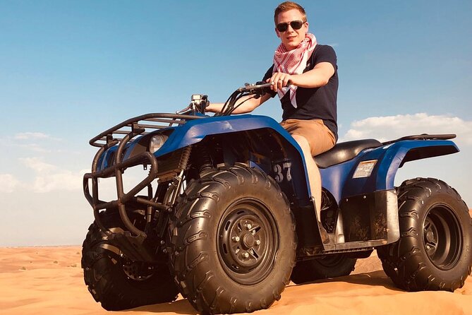 Sunset Quad/Buggy Tour & BBQ Evening - From Dubai pickup to the red dunes