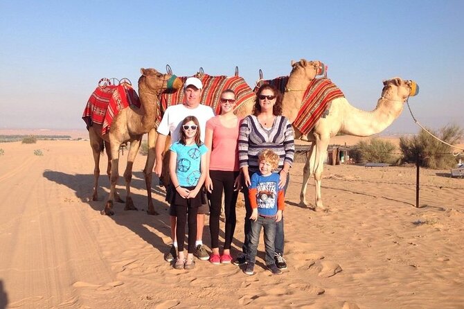 Thrilling Desert Safari Dubai Adventure with Sand Boarding and Barbecue Dinner - Camel riding, Arabic coffee, and camp traditions
