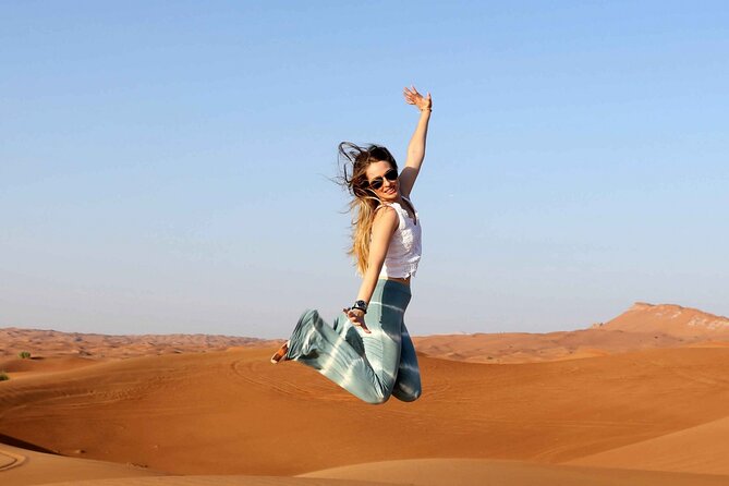 Thrilling Desert Safari Dubai Adventure with Sand Boarding and Barbecue Dinner - Barbecue dinner and the evening shows