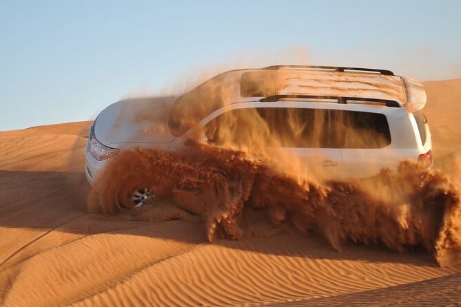 VIP Dubai Desert Safari with Quadbike,Sandboarding & BBQ dinner - Red dunes first, camp dinner later