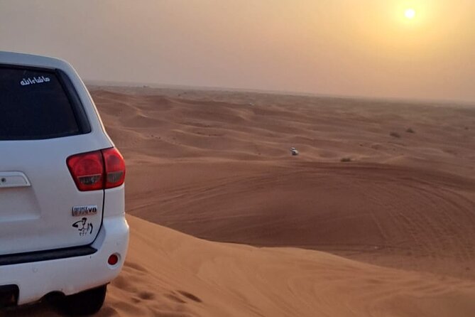 VIP Dubai Desert Safari with Quadbike,Sandboarding & BBQ dinner - Timing, clothing, and small practical points